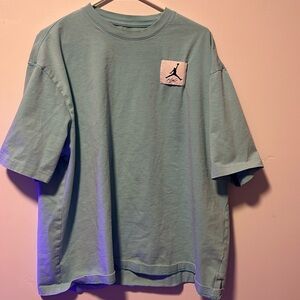 Men’s size large Jordan, white baby blue T-shirt